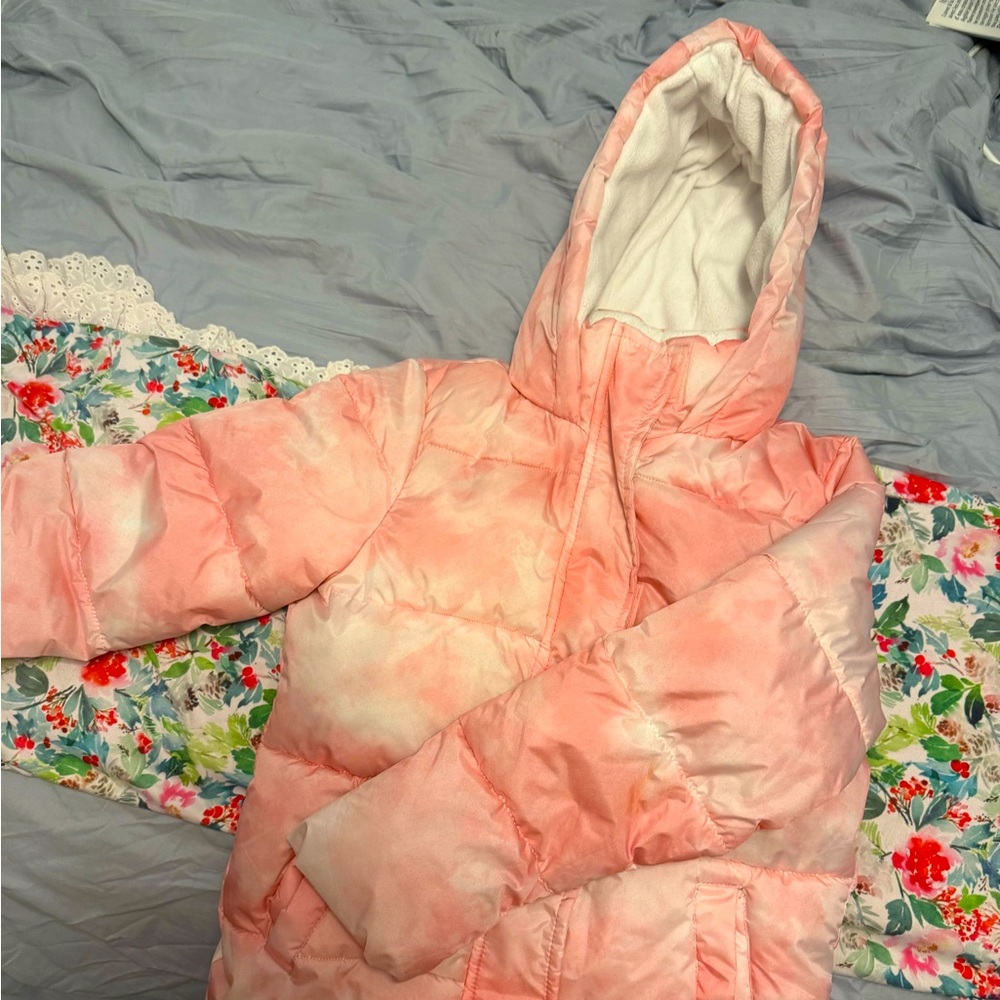 Hooded zip up puffer type coat with pockets